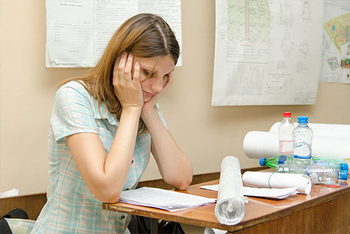 woman looking at papers