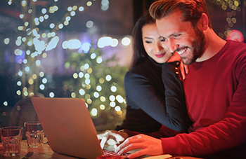 couple looking at laptop