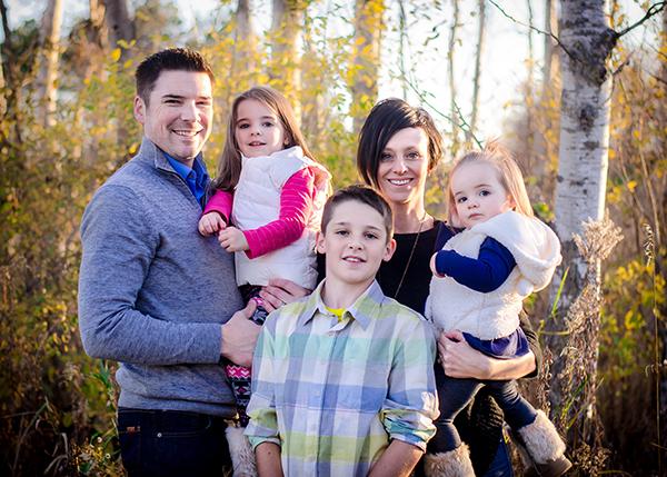 Happy family posing for photo