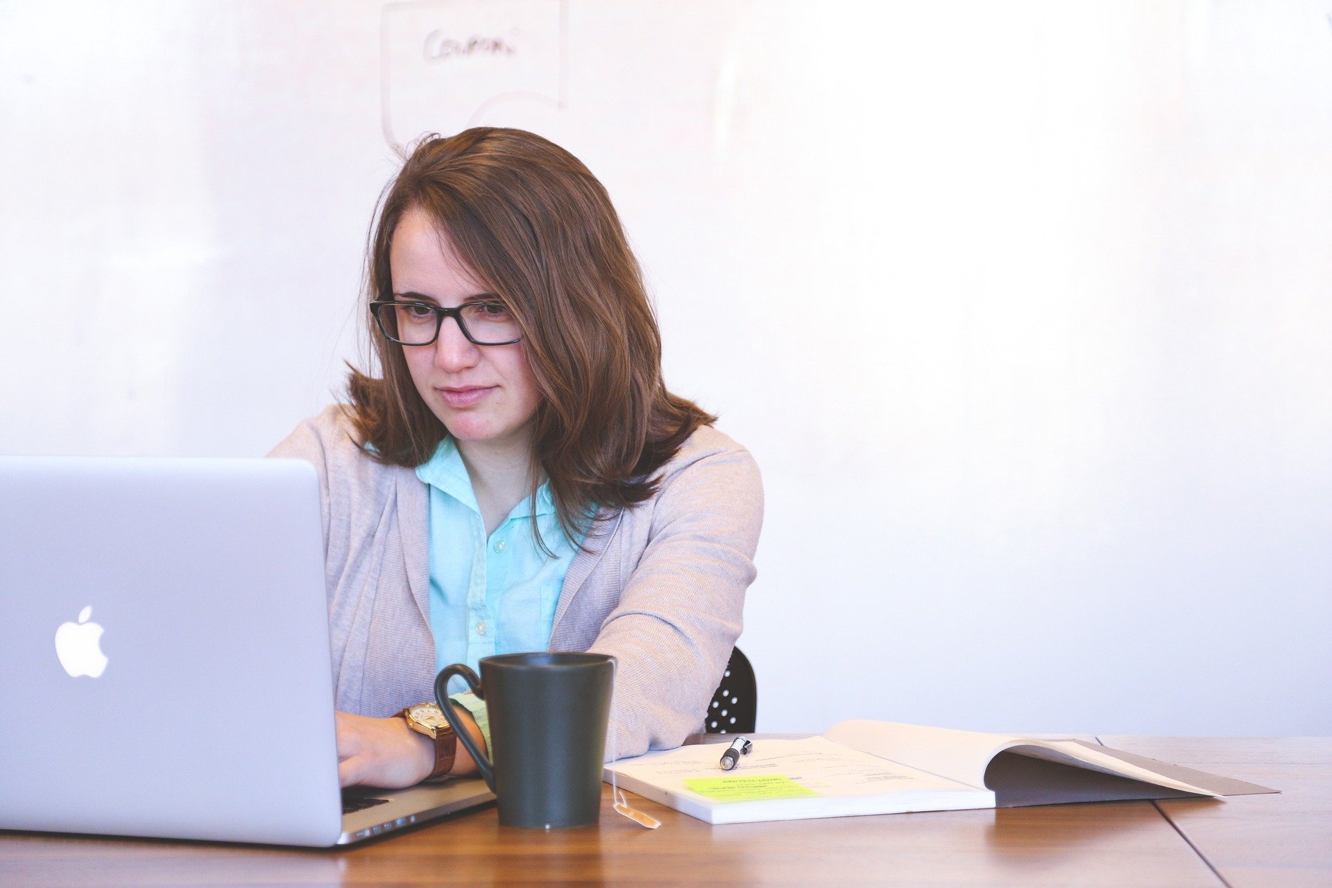 woman looking at a laptop